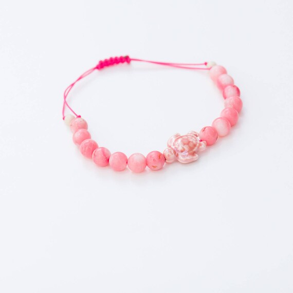 Bracciale o cavigliera regolabile a forma di tartaruga rosa con