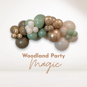 May include: A garland of green, brown and cream balloons with the text "Woodland Party Magic" in brown lettering.