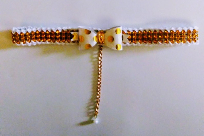 Gold bling crocheted choker with paper white gold polka dots bow tie