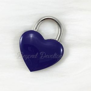 May include: A small, heart-shaped padlock with a silver finish and a dark blue enamel heart.