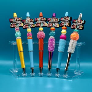 Bolígrafo con cuentas divertido: Bolígrafo brillante con múltiples personalidades