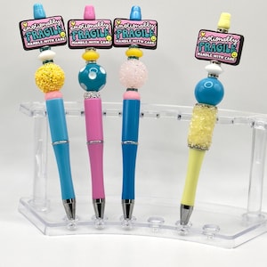 Stylo à bille coloré avec perles et perles émotionnellement fragiles