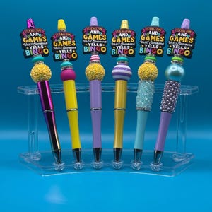 Todo es diversión y juegos hasta que alguien grita Bingo Bolígrafo con cuentas brillantes