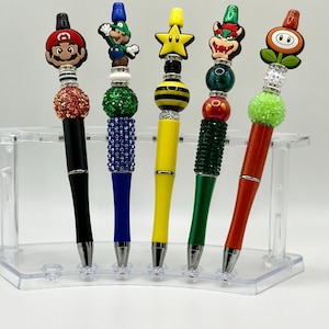 Caneta esferográfica com contas brilhantes inspirada no Super Plumber Gamer