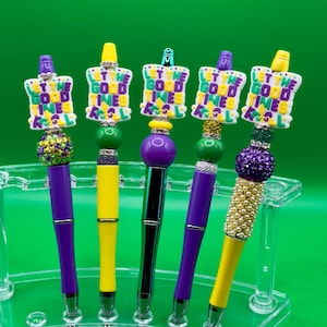 Penna a sfera con perline scintillanti, motivo: "Let the Good Times Roll" per carnevale di Mardi Gras bianco