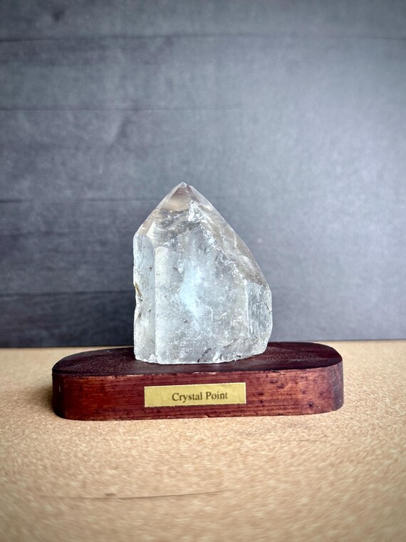 Clear Quartz Crystal on Wooden Stand: Healing Energy, Meditation Tool