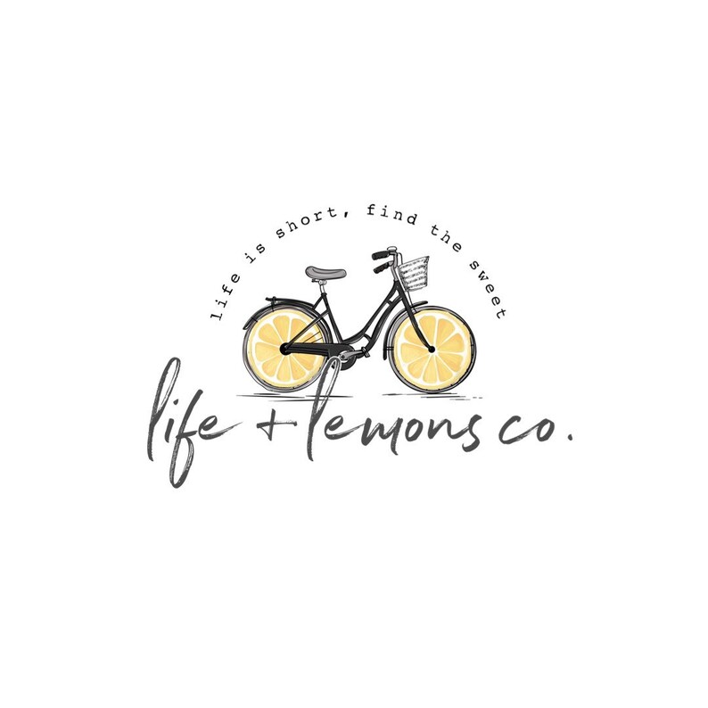 May include: Black bicycle with lemon slices for wheels. The text "life is short, find the sweet life + lemons co." is written around the bicycle.