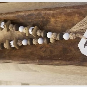 Smores wood bead garland. Wood bead garland, hand painted beads, Making smore memories wood tag and twine tassel