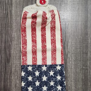Patriotic Hanging Kitchen towel with crocheted top. Distressed print American flag dish towel with yarn topper for hanging