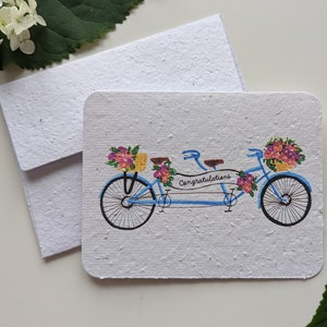 Bannière de félicitations pour vélo tandem sur papier à planter ou papier blanc aquarelle, bordures usées