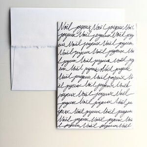 Carte de Noël, joyeux Noël en cursive sur aquarelle épaisse papier blanc cassé, bordures usées, voeux de Noël, noir et blanc