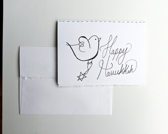 Carte de voeux, joyeux Hanoucca carte d'oiseau avec Hanoucca ornements étoile de David sur papier aquarelle blanc avec bordures usées