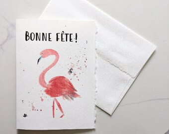 Happy birthday on plantable seed paper or watercolor white paper, colorful pink flamingo