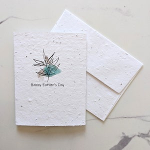 Carte de fête des pères, plante aquarelle bleu minimaliste sur papier à planter ou papier blanc aquarelle, bordures usées, fête des pères heureuse