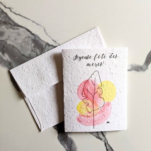 Enveloppe de carte plantable graines de fleurs sauvages, carte de fête des mères heureuse, feuille de plante aquarelle jaune rose sur papier de graines blanc, carte de remerciement