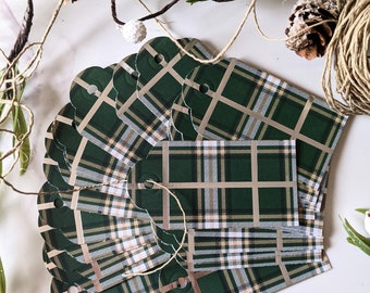 May include: A set of eight green and white plaid gift tags with scalloped edges and gold accents. The tags are tied together with twine.