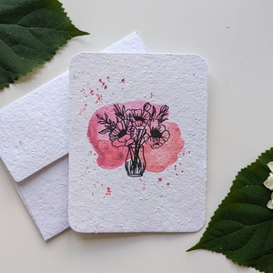 Bouquet de fleurs de pavot sur papier à planter ou aquarelle sur papier blanc, bordures usées