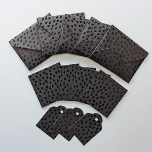 Set of cards with envelopes and gift tags black dots