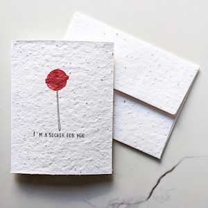Sucette à l’aquarelle sur papier graine plantable ou papier blanc aquarelle, je suis un suceur pour vous, carte d’amour, carte de Saint-Valentin, jeu de mots drôle