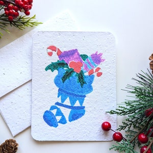 Carte de Noël, cadeaux bas bleus sur papier à planter ou papier blanc aquarelle, bordures usées