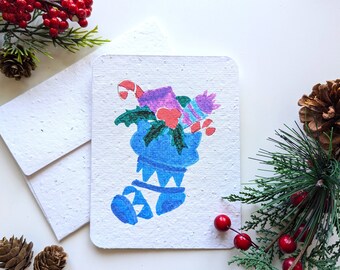 Christmas card, blue stocking gifts on plantable paper or watercolor white paper, worn out borders