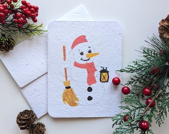 Snowman with broom on plantable paper or watercolor white paper, worn out borders