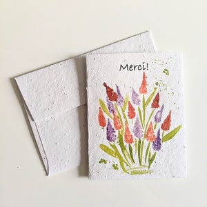 Gracias acuarela naranja púrpura flor de la planta en papel de semilla plantable o papel blanco de acuarela, tarjeta de agradecimiento, amistad