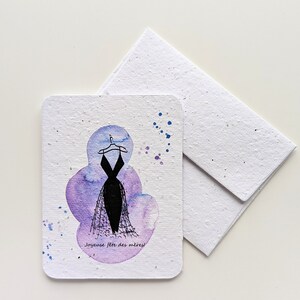 Carte de fête des mères, robe noire pour femme sur cintre sur du papier de graines à planter ou du papier blanc aquarelle, bonne fête des mères