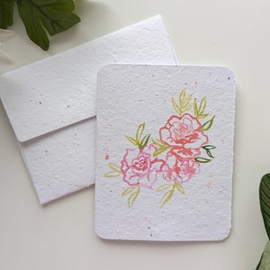 Aquarelle de roses sauvages sur papier à planter ou papier blanc aquarelle, bordures usées