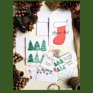 Deux graines de fleurs sauvages enveloppe pour carte de Noël à planter, six étiquettes cadeaux à planter, bas, arbre de Noël sur papier blanc pour graines de fleurs sauvages
