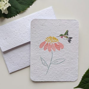 Colibri et fleur aquarelle sur papier à planter ou papier blanc aquarelle, bordures usées