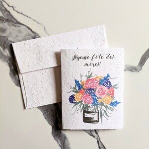 Busta di carta piantabile semi di fiori selvatici biglietto per la festa della mamma, fiori colorati in vaso su carta bianca, biglietto per la festa della mamma felice
