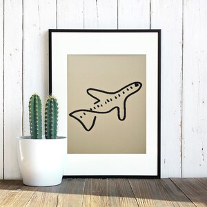 Twisted minimalist air plane black marker drawing on a yellow mustard colored paper, wall art decor, gift, poster art