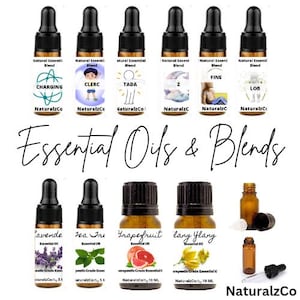 May include: A collection of essential oil blends in amber glass bottles with dropper tops. The bottles are labelled with the names of the blends, including "Charging", "Clerc", "Tada", "Z", "Fine", and "Lob". The bottles are also labelled with the brand name "NaturalzCo".
