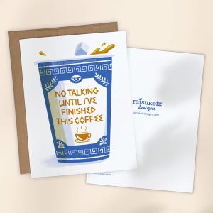May include: A blue and white coffee cup with a Greek key design and the text "No talking until I've finished this coffee".