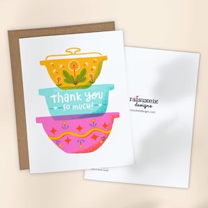 May include: A greeting card with a stack of three colorful bowls. The top bowl is yellow with a dandelion design. The middle bowl is blue with the text "thank you so much!" The bottom bowl is pink with a geometric pattern. The card is blank inside.