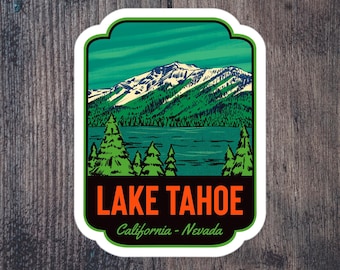 May include: A green and white sticker with a vintage illustration of a mountain range and lake. The text "LAKE TAHOE" is in orange with "California - Nevada" in green below.