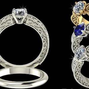 May include: A collection of ornate engagement rings with intricate filigree detailing. The rings feature a variety of gemstones, including a clear diamond and a blue sapphire, set in gold and silver bands. The rings are displayed against a black background.