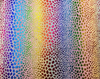 May include: A rainbow-colored fabric with a textured, glittery surface. The fabric has a repeating pattern of small, rounded shapes.