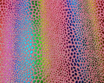 May include: A pink fabric with a rainbow pattern of small, iridescent dots. The dots are arranged in a curved pattern, creating a wave-like effect.