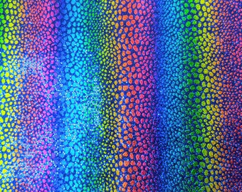 May include: A rainbow-colored fabric with a textured, speckled pattern. The fabric has a dark blue background with vertical stripes of red, orange, yellow, green, blue, indigo, and violet.