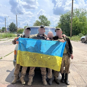 Ukraine Flag signed by Ukranian Armed Forces Soldiers 68 brigade with 5 patches