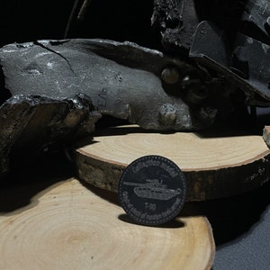 Mini Token-tag of Russian combat tank made of burned amor t 90 from Ukraine , handcrafted