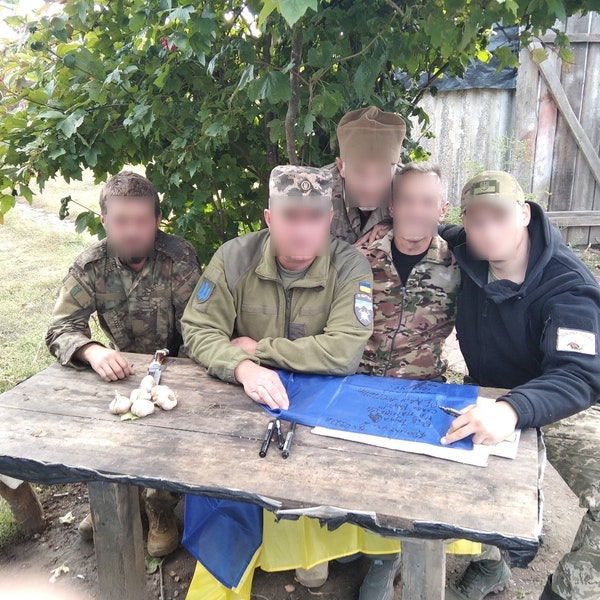 Ukraine Flag signed by Ukranian Armed Forces Soldiers 68 brigade with 5 patches