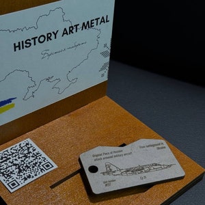 Handcrafted Keychain Recycled from Aircraft Su 25, Tag of russian Aircraft recycled of Amor Su25, Piece of Aircraft from Ukraine on stand
