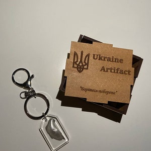 HandCrafted Epoxy Keychain of Russian airplane made of burned amor Cy 30 recycled in Ukraine