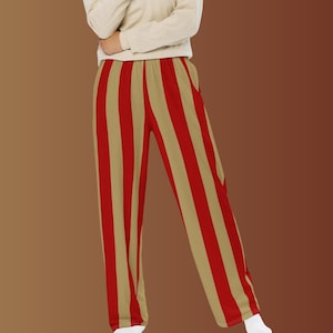 May include: Wide-leg pants with vertical stripes in red and beige.