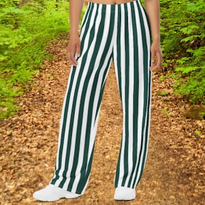 May include: Wide-leg pants with alternating white and dark green stripes. The pants have an elastic waistband and a relaxed fit.