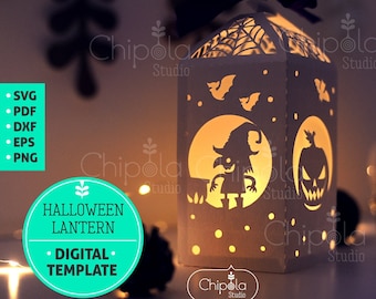 Puede incluir: Una linterna de Halloween de papel blanco con un diseño de bruja y calabaza. La linterna está iluminada desde el interior, creando un brillo cálido. La linterna es una plantilla digital que se puede descargar e imprimir.