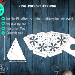 May include: A printable DIY lantern template featuring a snowflake design. The template is 5 inches tall and 3.5 inches wide. The instructions state that no glue is needed and the lantern can be unfolded and kept for future use. The template is also scalable and fits a small mat.